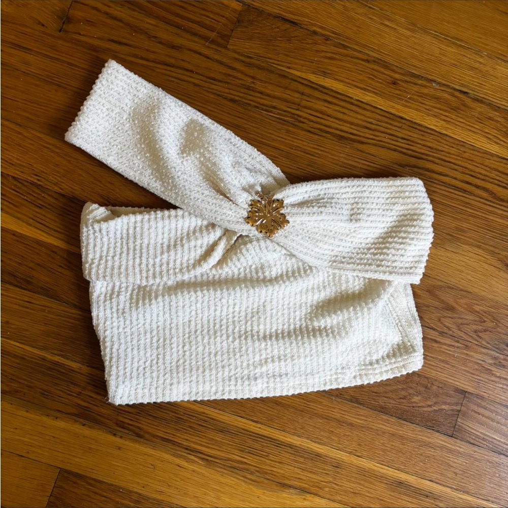 White one shoulder cream Top with Gold Clover Accent